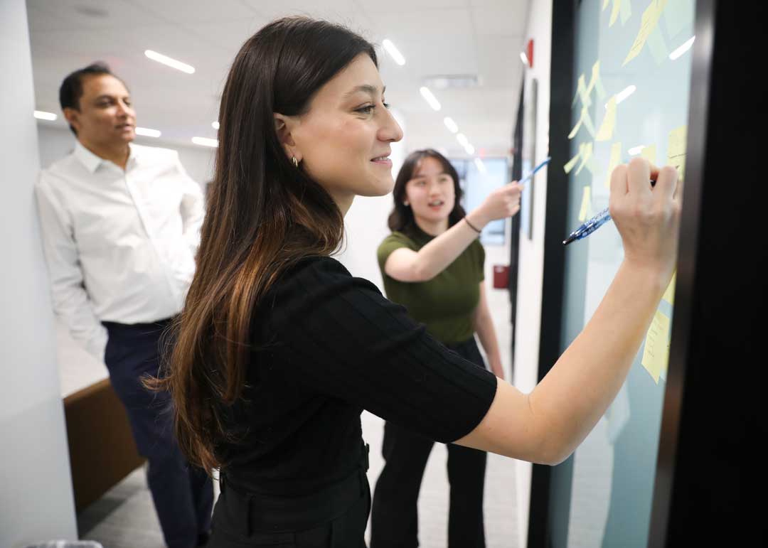 IGI Team at work with post-it notes in DC offices